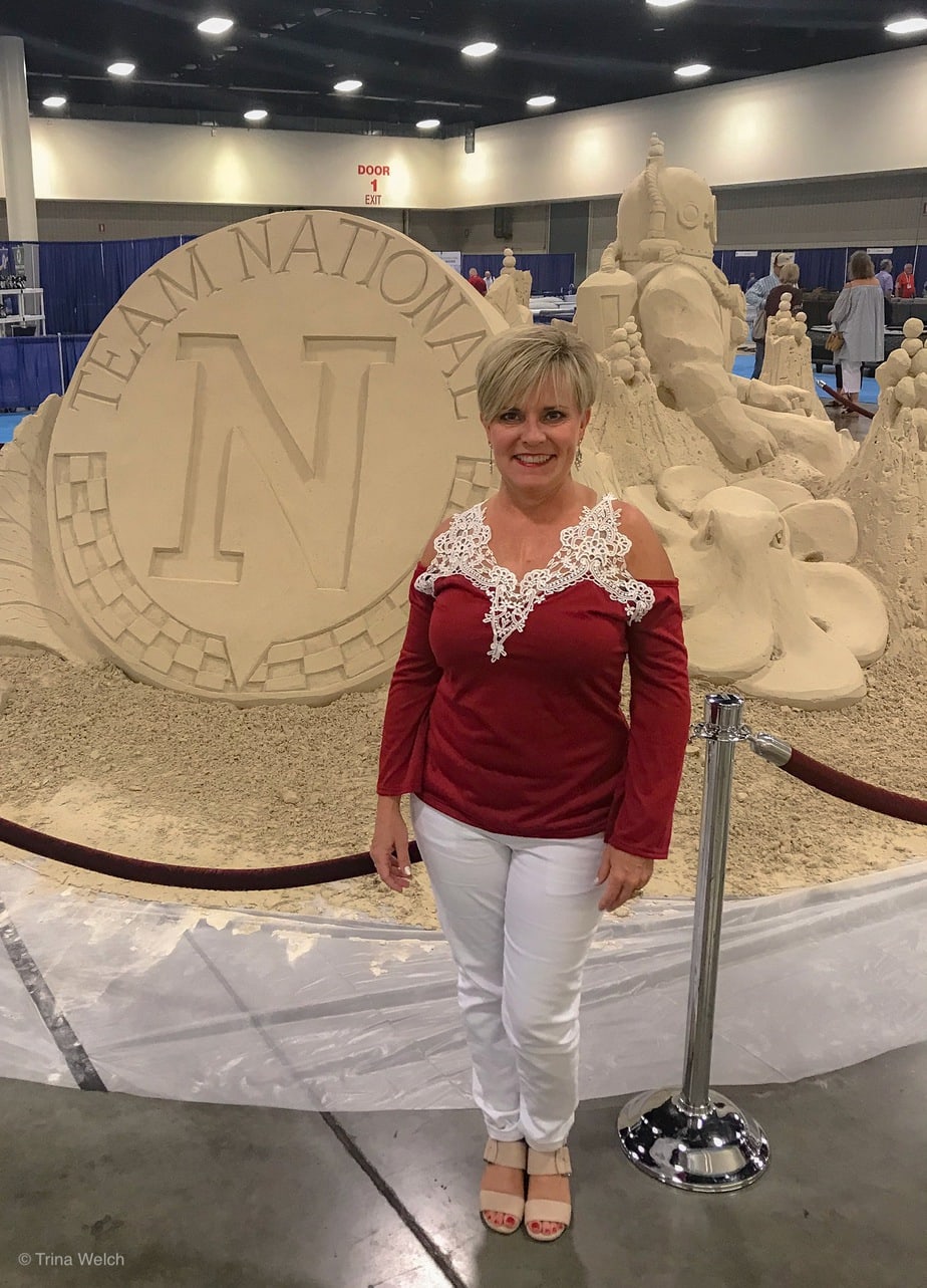 www.redneckrhapsody.com Trina in front of TN Summer 2018 sand display in the Ft. Lauderdale Conventions center.
