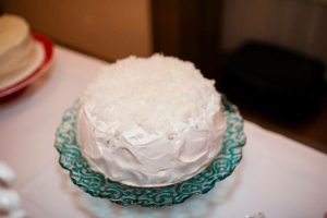 www.redneckrhapsody.com The most delicious coconut cake on a beautiful glass teal cake plate. www.redneckrhapsody.com