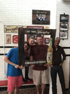 www.redneckrhapsody.com Bill, Trina, Noah & CB all posing with a cardboard frame in the tap room after the tour & taste.