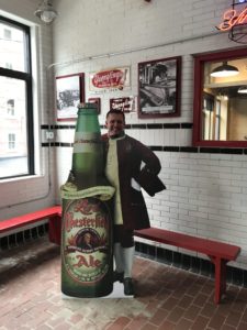 www.redneckrhapsody.com CB striking a pose with a big cardboard Yuengling beer in the tap room.