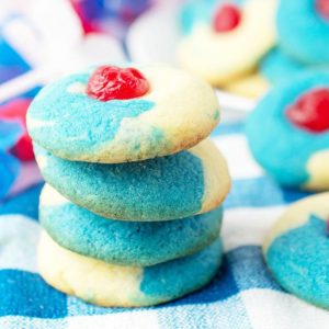 Blue and white swirl cookie with red accent.