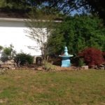 Backyard view with fountain planter 2014