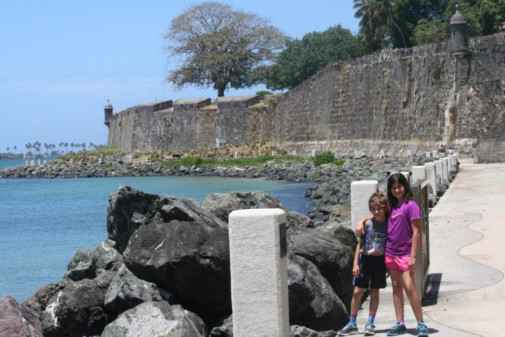 Vacation adventures and exploring ocean walkway around El Morro, Puerto Rico with the kids.