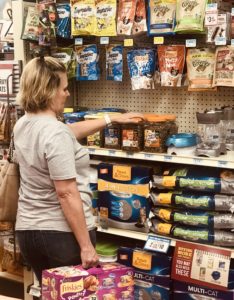 Shopping at Tractor Supply Co. for Friskies Cat food