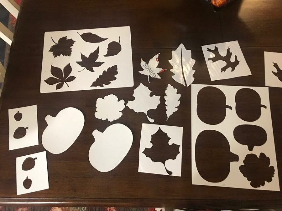 Trinas cuts out some fall stencils using her Cricut
