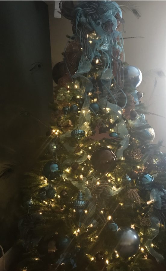 Exciting room makeover so I can change up Christmas decor - this tree is brown, ice blue, and gold