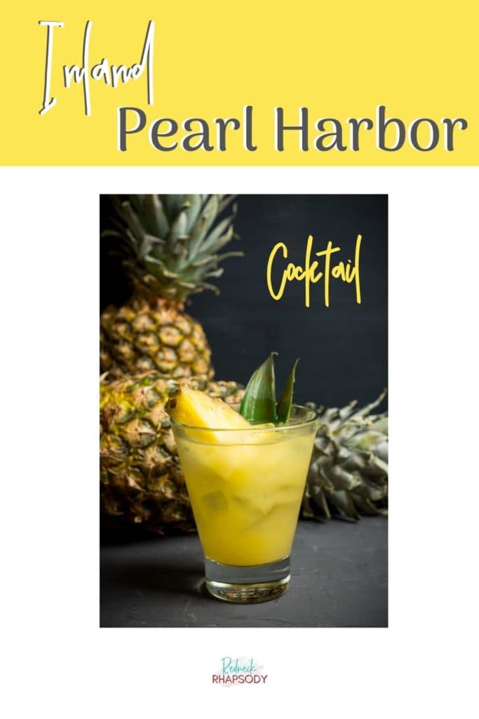 Inland Pearl Harbor Cocktail ready to drink with pineapples in background - pin 1.