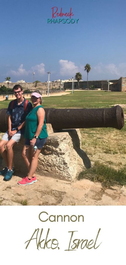 Noah and Trina standing by cannon in Akko, Israel - Pin 6