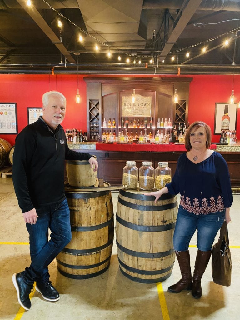 Phil and Trina in the barrel room at Rock Town Distillery