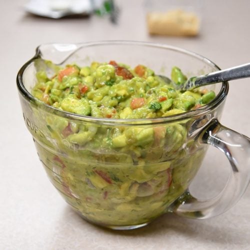 An entire bowl of healthy guacamole recipe; 2 avocado, 1 tomato - makes 4 cup bowl full.