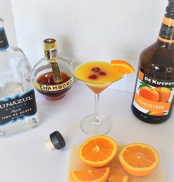 All the ingredients need to make this perfect cocktail glass full of Southern Tequila Sunset.